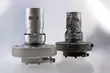 Comparison of two industrial EagleBurgmann sealing components, showing a new polished unit beside a heavily worn and damaged unit to illustrate product performance and service replacement needs.