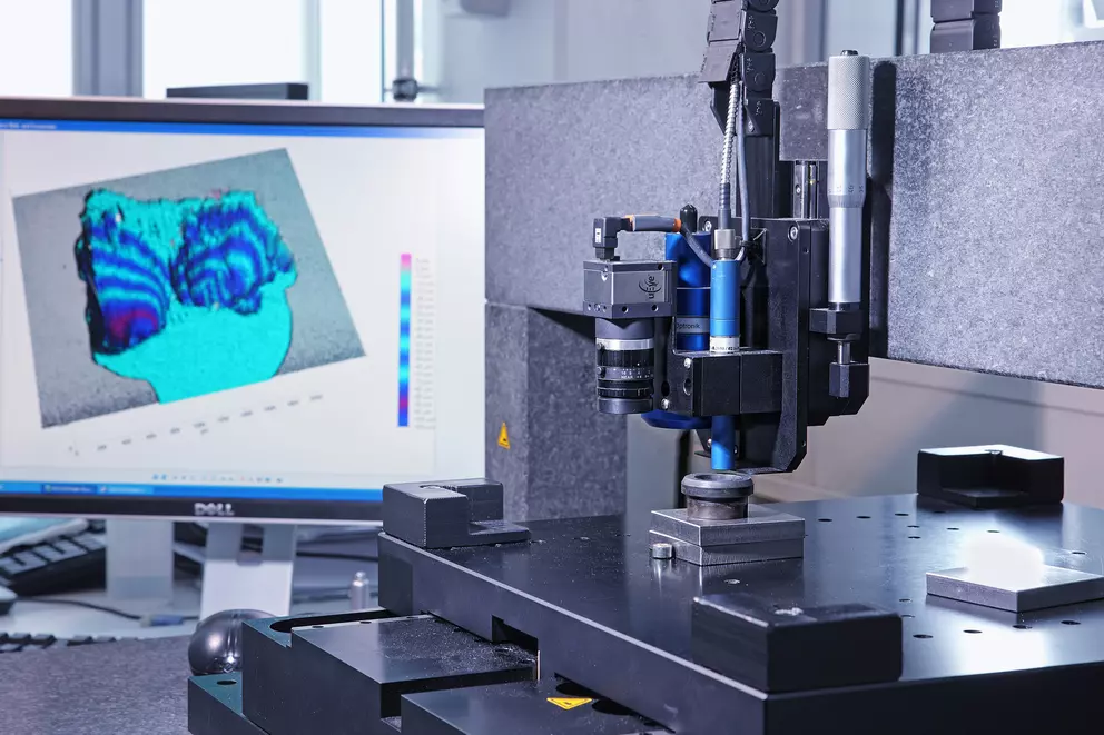 Coordinate measuring machine analyzing surface and geometric data of an industrial sealing component for quality inspection and precision metrology.