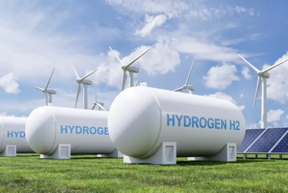 Hydrogen storage tanks powered by renewable energy sources like wind and solar, supporting sustainable energy systems.