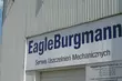 EagleBurgmann service center sign on an industrial building facade in Poland, highlighting mechanical seal service operations and local company presence.