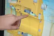 Close-up of a hand pointing at a technical cross-section drawing of an industrial sealing system on a computer screen, illustrating engineering design, analysis, and sealing technology expertise.